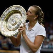 Petra Kvitova kisses the Wimbledon trophy in 2014 (Jonathan Brady/PA)