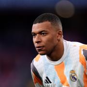 Kylian Mbappe will continue his recovery back at Real Madrid’s team base (John Walton/PA)