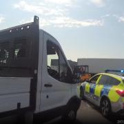 Suspected drunk driver caught with knives on dashboard