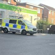 Police outside the Co-op store on Archers Road