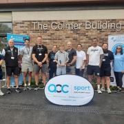 Staff at Itchen College, alongside Joe Colmer, and Lucy Callingham from AOC Sport gather outside The Colmer Building as Glenn Colmer is posthumously inducted into the AOC Sport Hall of Fame