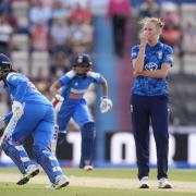 England's Lauren Filer (right) reacts as India's Harleen Deol (left) and Pratika Rawal (centre) hits more runs during the Women's IT20 at the Utilita Bowl, Southampton.