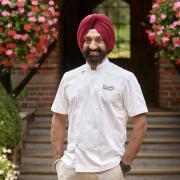 Chef Jolly outside Careys Manor Hotel & SenSpa