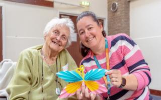 Jocelyn and Sarah with butterfly