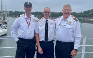 Steve Collins and Donald Neaves of the MVS with Captain of Ocean Scene Lee Rayment (centre)