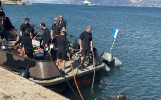 Divers in the 17 Port and Maritime Regiment plunge into the water during training