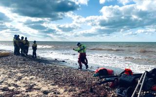 Rescue teams at the West Wight beach.