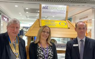 Bob Hitchins, Fareham Rotary Club President, Sarah Jacobs from Age Concern Hampshire, and Mike Taylor, Centre Manager at Fareham Shopping Centre