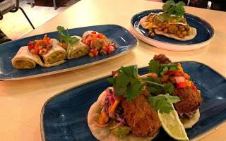 Clockwise from left: The ackee and saltfish, trini doubles and fish tacos