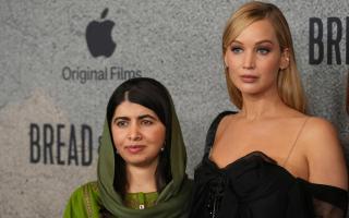 Malala Yousafzai and Jennifer Lawrence at the LA premiere of Bread & Roses (Chris Pizzello/AP)