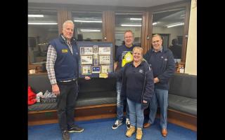 Jules and Debs along with Calshot LOM Mike Atwell and Jules' Uncle Ron with the commemorative display gifted to Calshot station