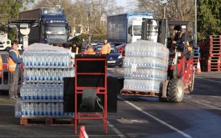 Long queues as people collect bottles of water at Places Leisure in Eastleigh.