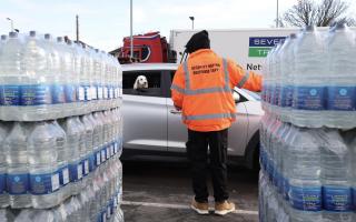 Long queues as people collect bottles of water at Places Leisure in Eastleigh.