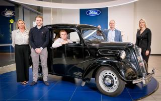 Members of the Hendy family celebrate family heritage with the purchase of a classic Ford Anglia. L to R: Rebecca Hendy, Will Hendy, Ben Hendy, Paul Hendy, Ellie Hendy