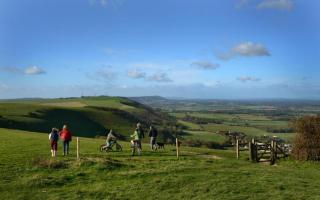 People enjoying the South Downs National Park at Devil's Dyke