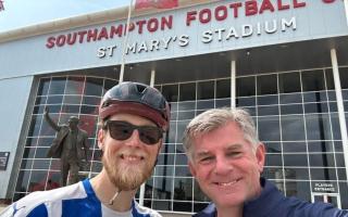 Matt Jopson, left, celebrating reaching St Mary's Stadium with a holidaymaker, right.
