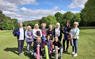 Pilates instructor Andrea Hill (5th from the left), who is hosting a Charity Day in aid of Communicare