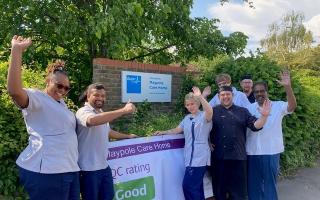Staff from Maypole Bupa Care Home celebrating the 