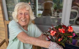 Hands-on gardening brings smiles to Memory Lane residents