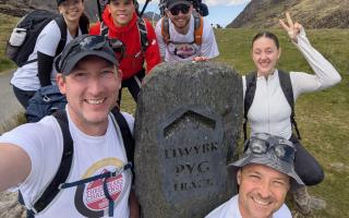Romsey School staff celebrate summit of Snowdon during charity trek