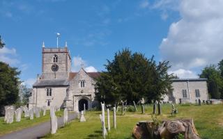 Church presides over the village