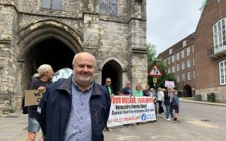 Ted Hill, Hamble resident and businessman, protesting at Hampshire County Council against the proposed quarry. Image: LDR